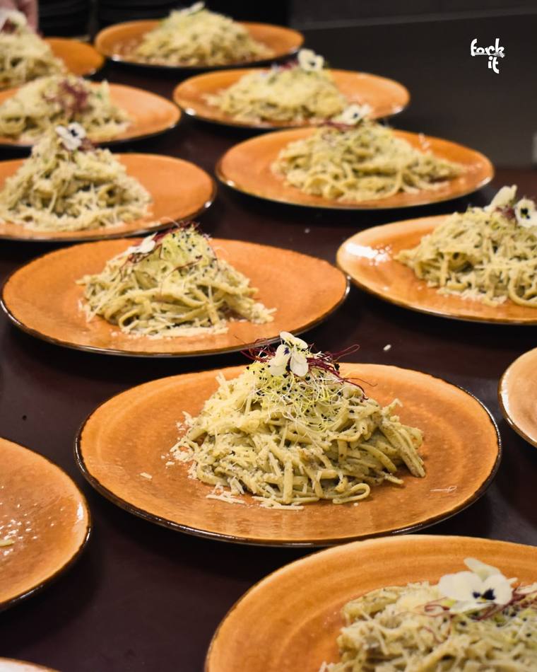 Fresh pasta plates finished with edible flowers