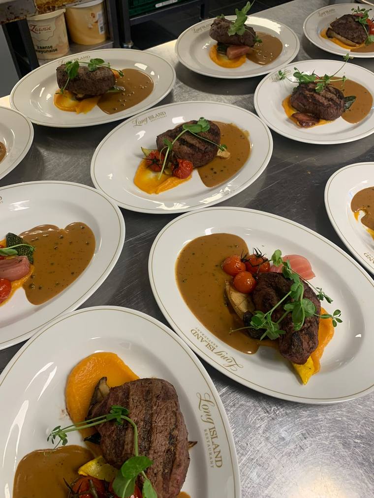 Plated tenderloin with squash purée for a private catering event